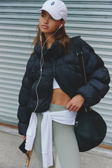 In A Bubble Puffer Jacket: Black